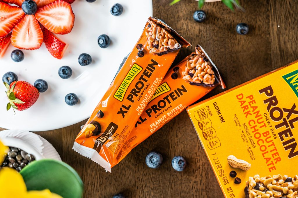 Nature Valley XL Protein Bars with Peanut Butter Dark Chocolate flavor, packed with protein, perfect for energizing trail snacks during hiking adventures.