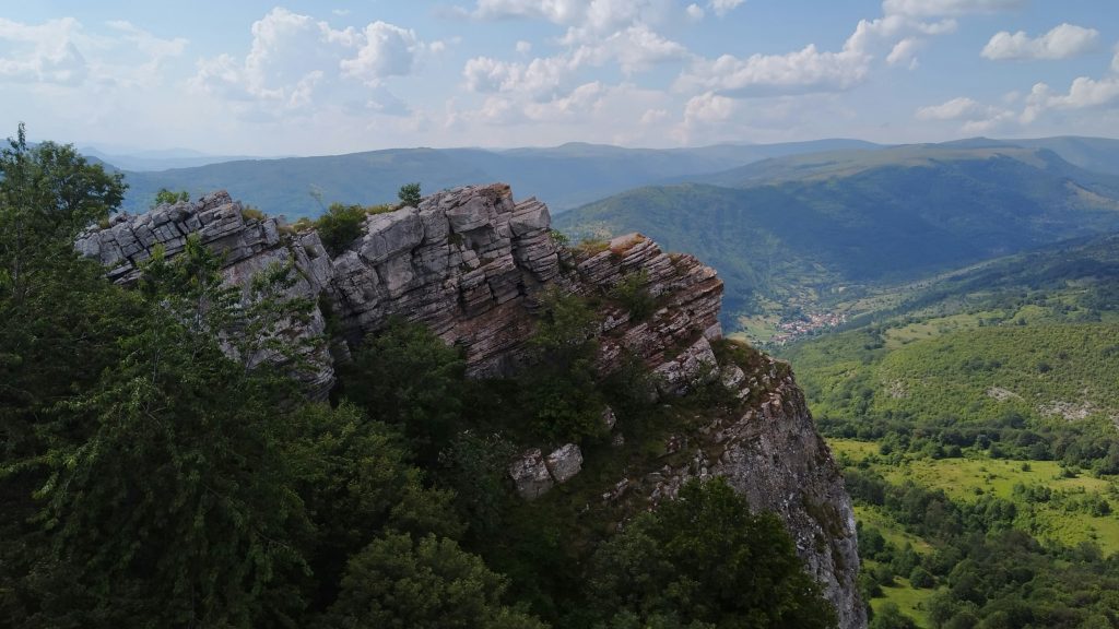 Majestic rock formations and green valleys at Stara Planina, a prime location for scenic hikes in Serbia.