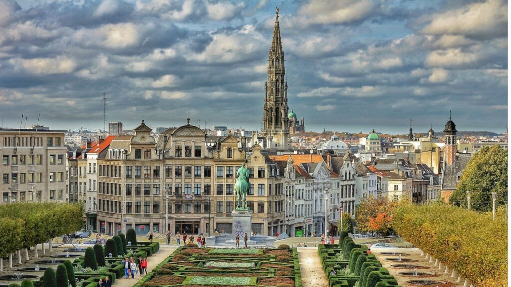 Panoramic view of Brussels city skyline with historic architecture, gardens, and landmarks, ideal for a Brussels city travel guide.
