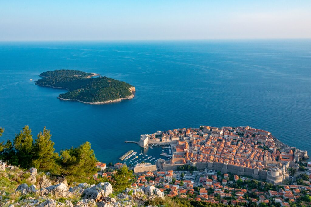 Hiking in Dubrovnik stunning coastal cliffs historic fortress views and turquoise Adriatic waters along the shoreline