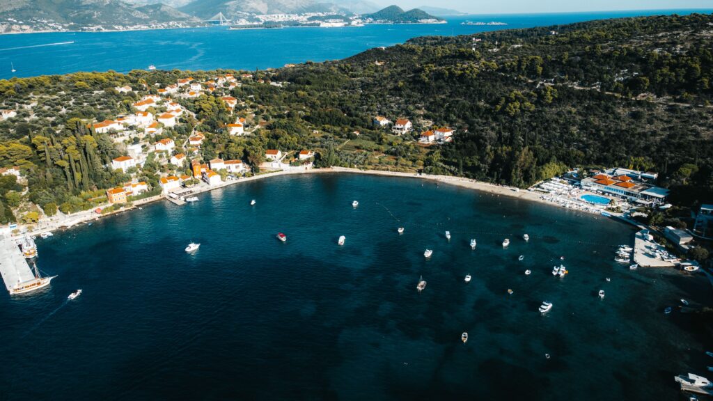 Koločep Island Coastal Loop overlooking a tranquil Adriatic bay, coastal villages, and scenic island hiking trails.