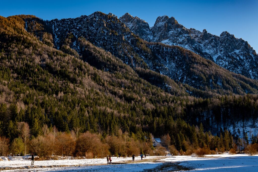 Kranjska Gora Slovenia surrounded by snow-capped mountains, alpine forests, and scenic winter landscapes