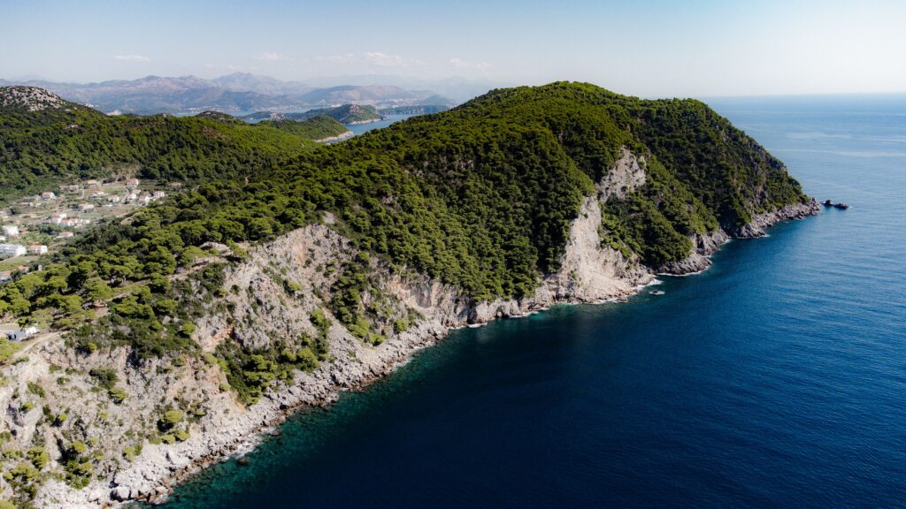 Lopud Peninsula Trail along Dubrovnik’s coastline, featuring dramatic sea cliffs, pine forests, and Adriatic views.