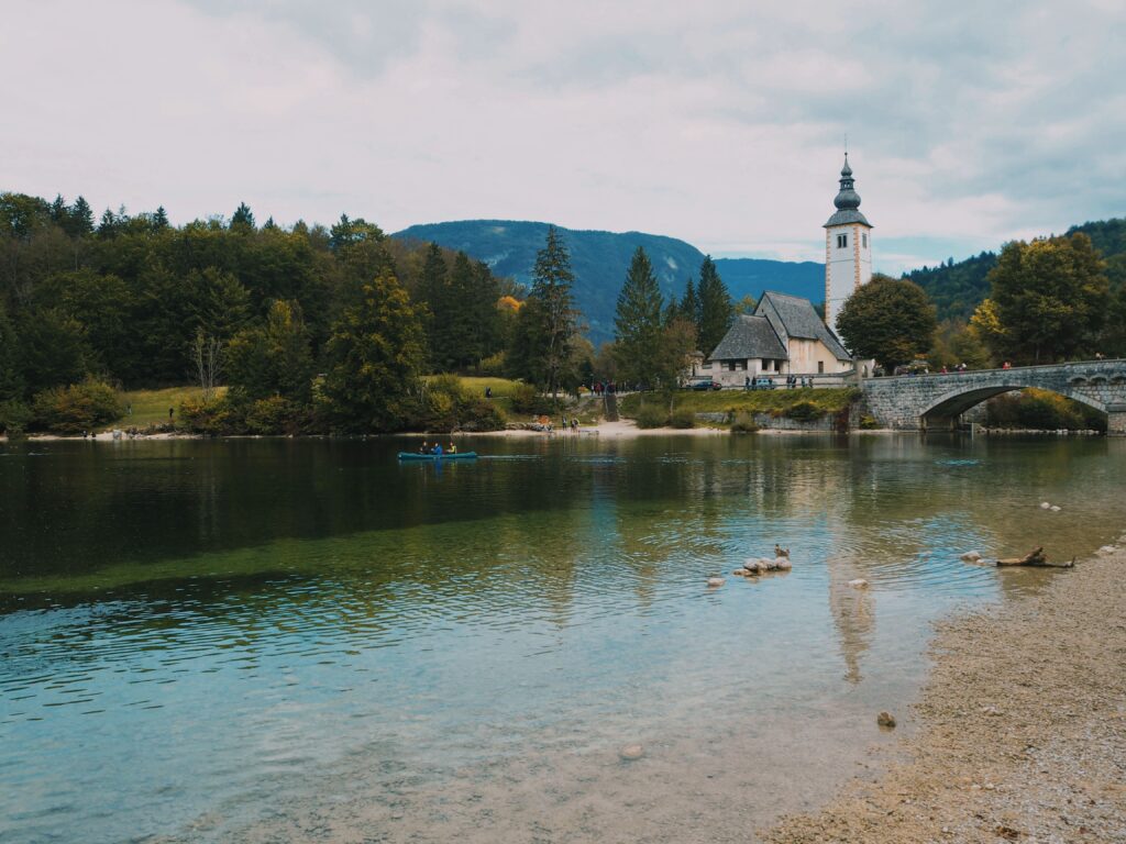 Stara Fužina Slovenia surrounded by alpine mountains, forests, and scenic trails near Lake Bohinj