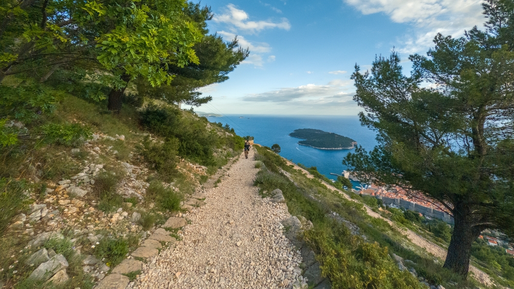 Mount Srđ Trail Dubrovnik with panoramic Adriatic Sea views, coastal scenery, and a scenic hiking path above Dubrovnik.