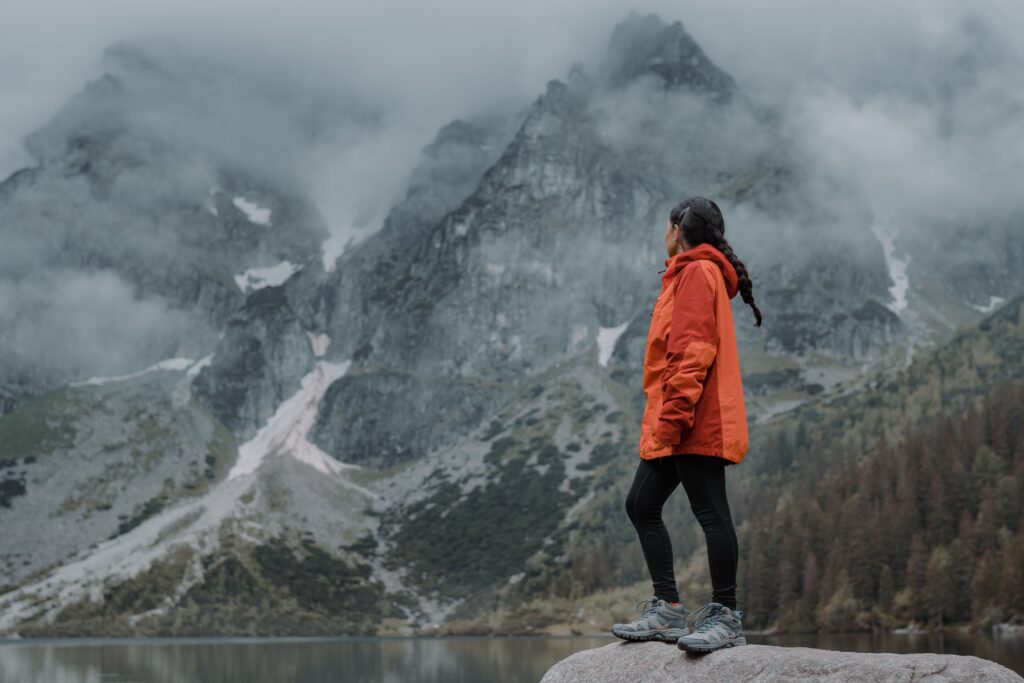 Fit and Comfort on the Trail with hikers wearing waterproof jackets during a scenic mountain walking adventure.
