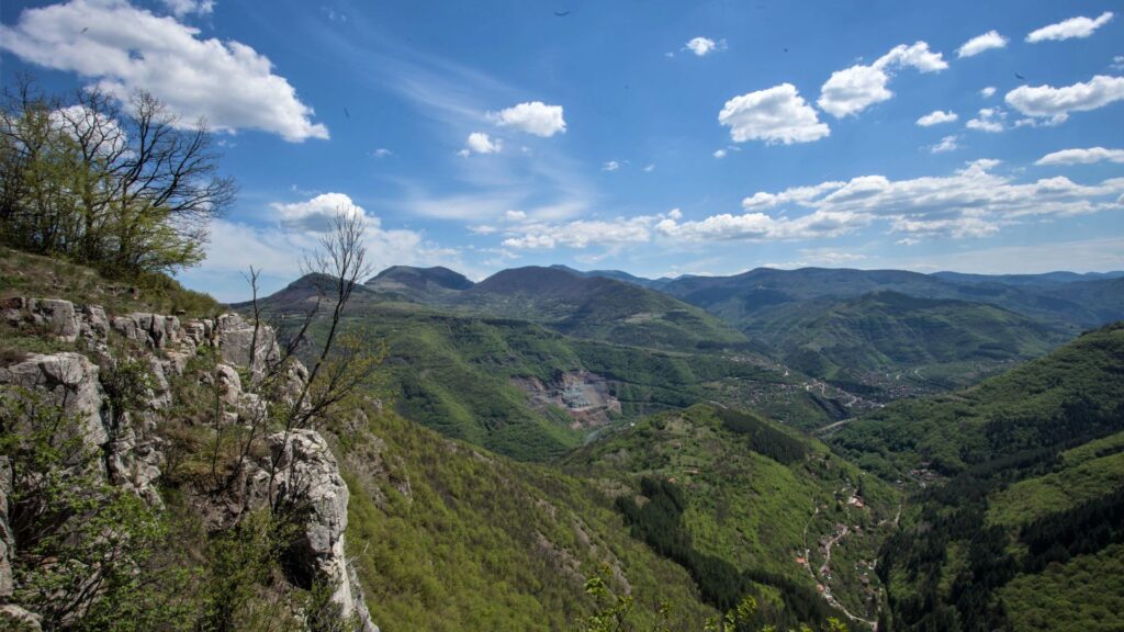 Sofia a City Guide for Hikers: panoramic mountain and valley view near Sofia with scenic hiking trails and cliffs