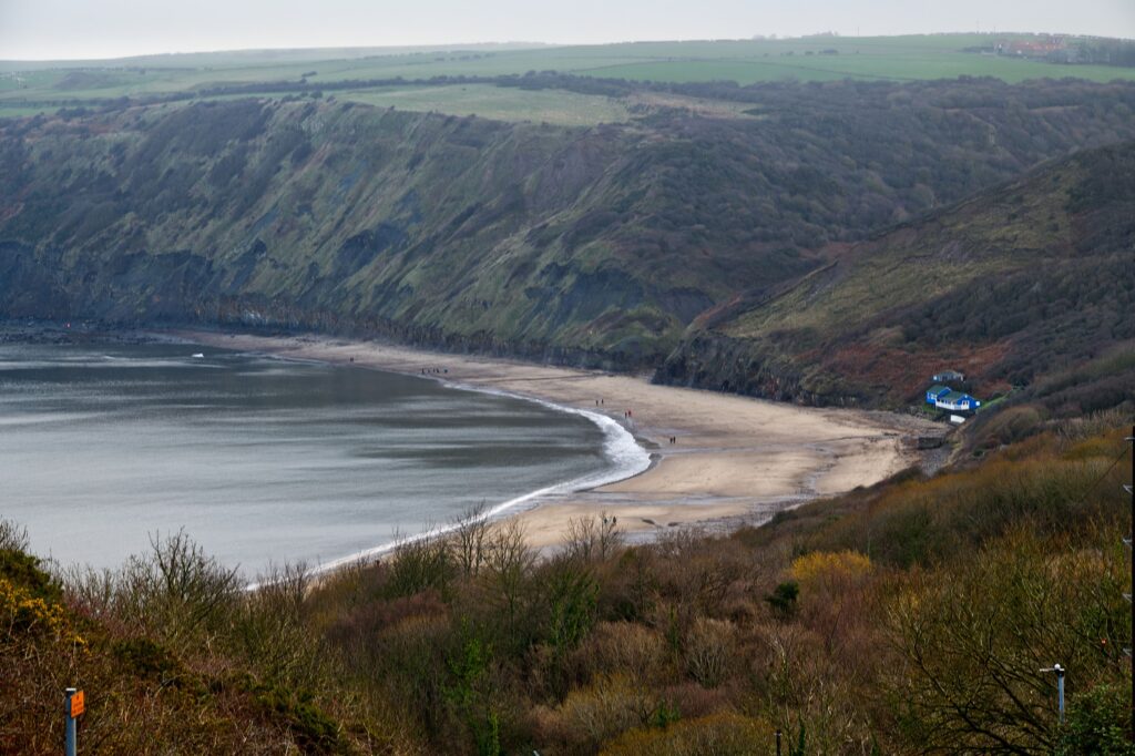 RunswickBayYorkshire Kayde Parker Runswick Bay beach with sweeping coastal cliffs and scenic shoreline one of the best views of Runswick Bay Yorkshire