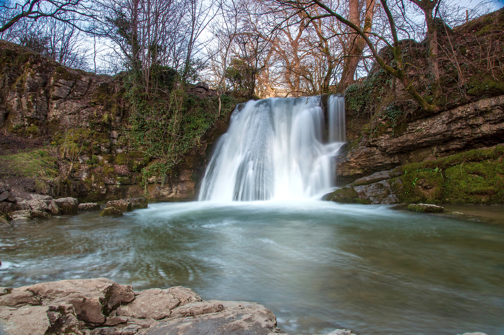 Janet's Foss waterfall along the Janets Foss Loop, a scenic woodland walk in the Yorkshire Dales National Park