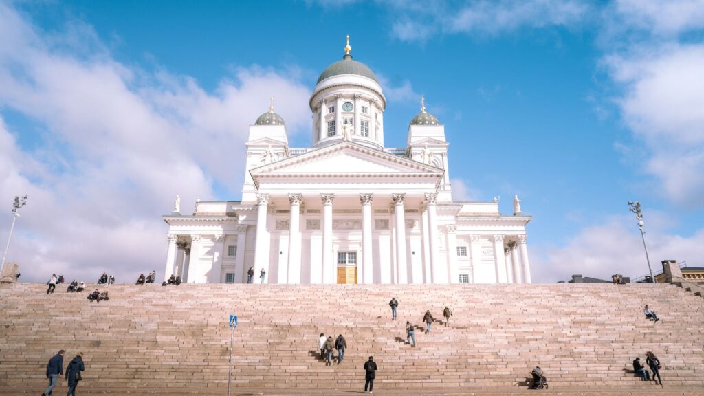 HelsinskiACityGuideForHikers Kayde Parker Helsinki city guide for hikers featuring Helsinki Cathedral under a bright blue sky